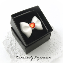 Adjustable white bow ring