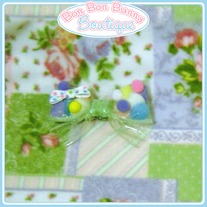 Glittery Green Pom Pom Bow