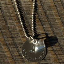 Silver Handstamped necklace "I am unbreakable" with silver heart