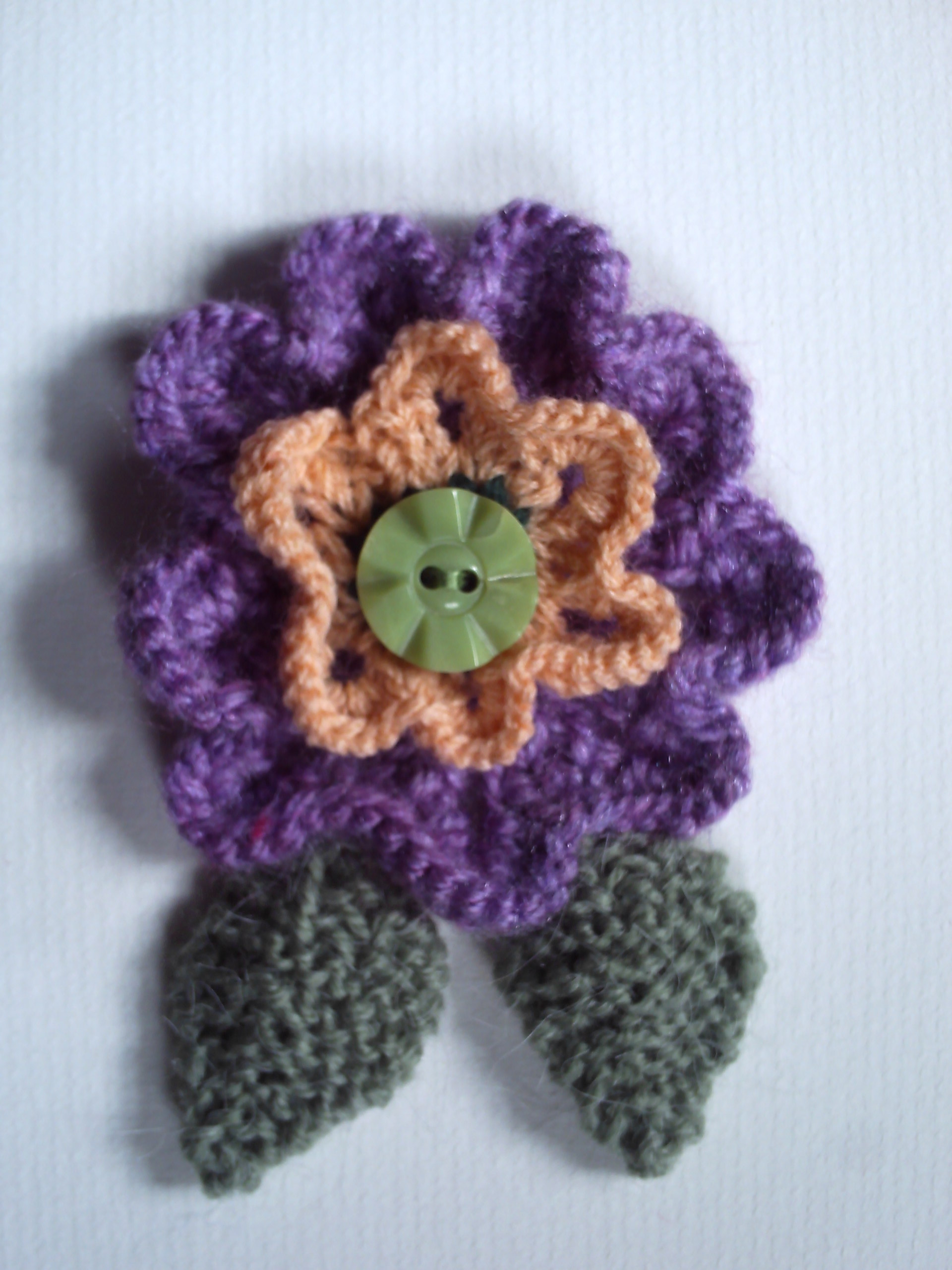 OOAK hand knitted flower brooch pin. Purple heather and peach. on Storenvy