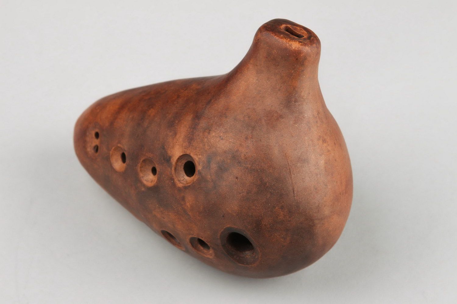 Ceramic handmade ethnic musical instrument brown ocarina globular flute