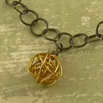 Gold & Black Wire Orbital Ball Pendant Necklace