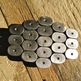 Silvermetalovalknouckoutbeltbuckleclose_small