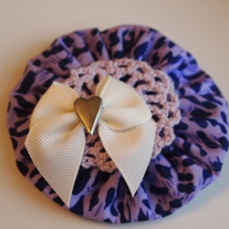 Leopard flower with crochet and bow detail