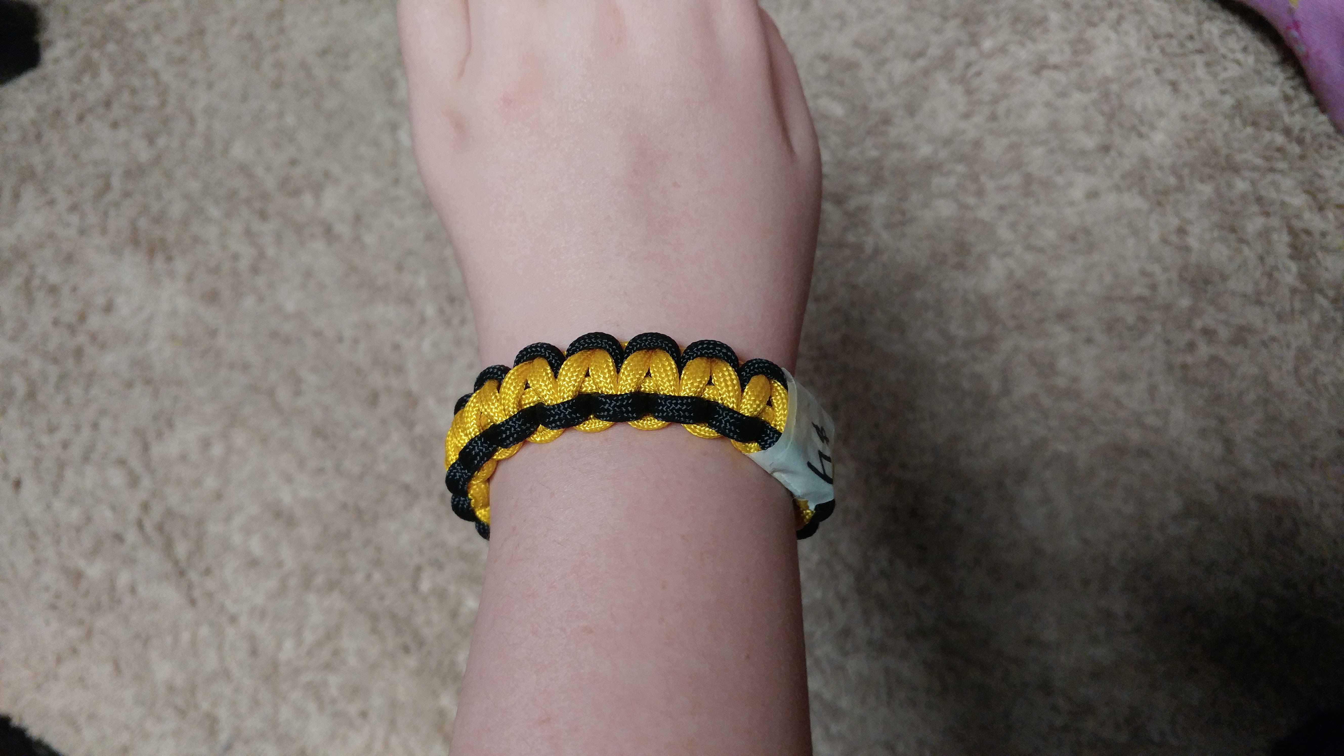 black and yellow bracelet