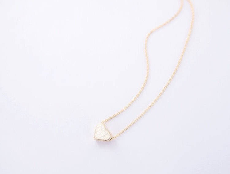gold tiny heart pendant