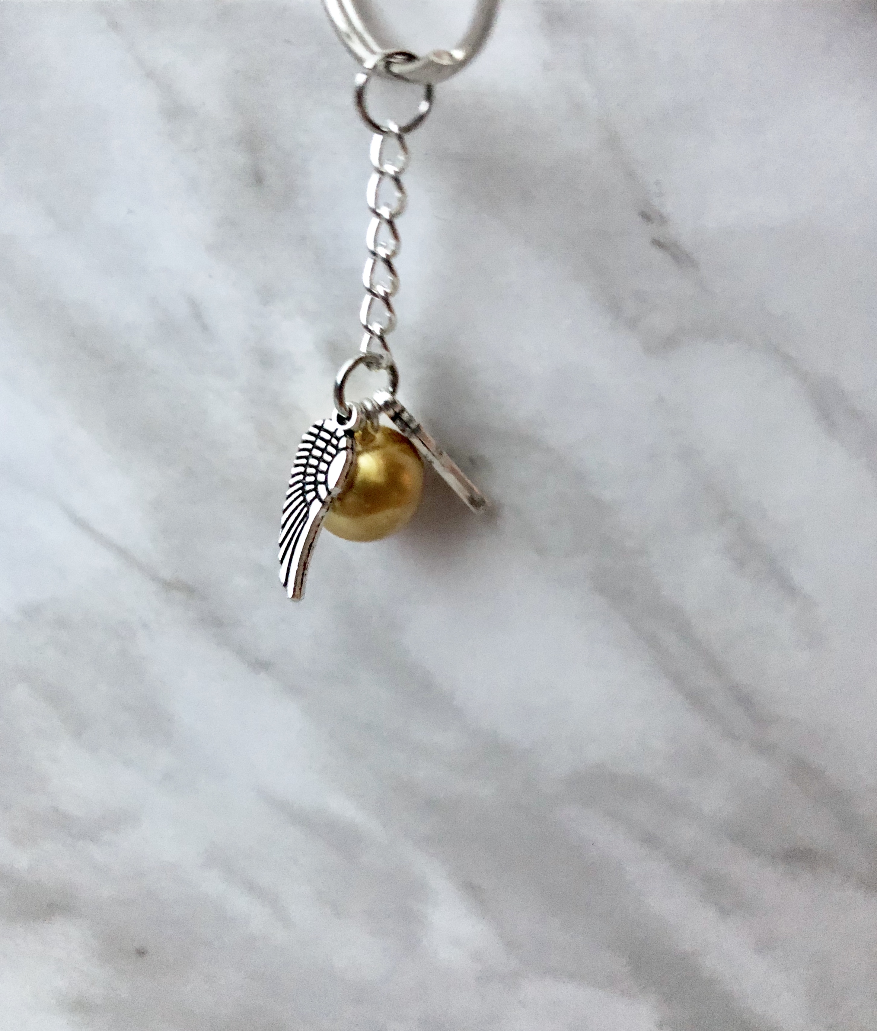 golden snitch keychain
